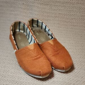 TOMS Womens Slip Ons in Orange